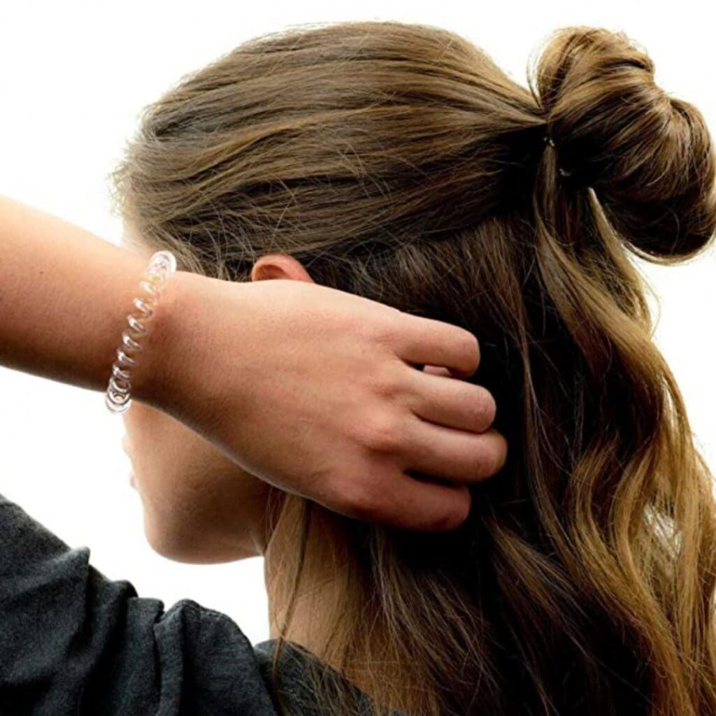 Woman with scrunchy on her wrist